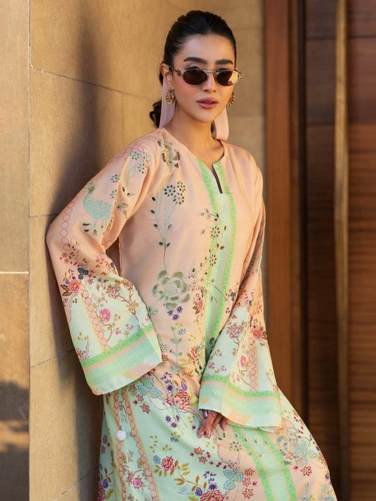 Khizra 2-piece silky lawn suit – pastel peach floral print shirt with wide palazzo pants, summer Eid collection